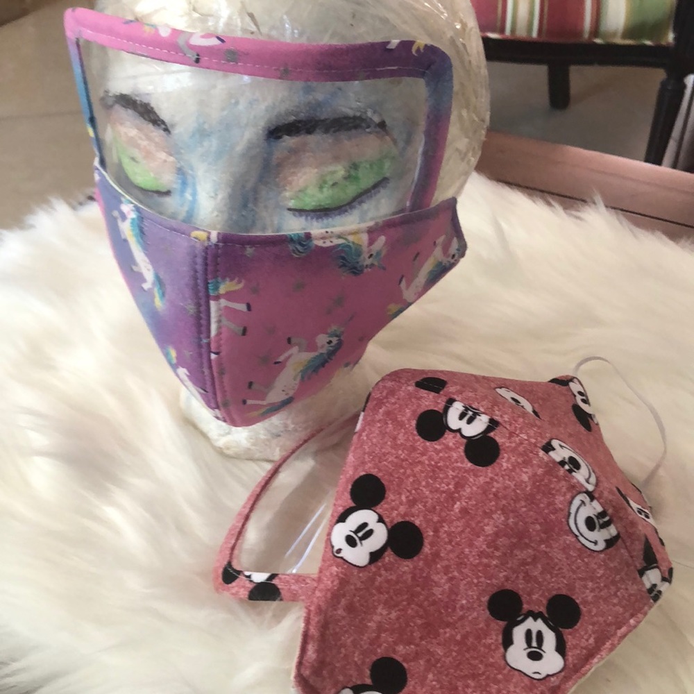 Face mask covers mouth and eyes.